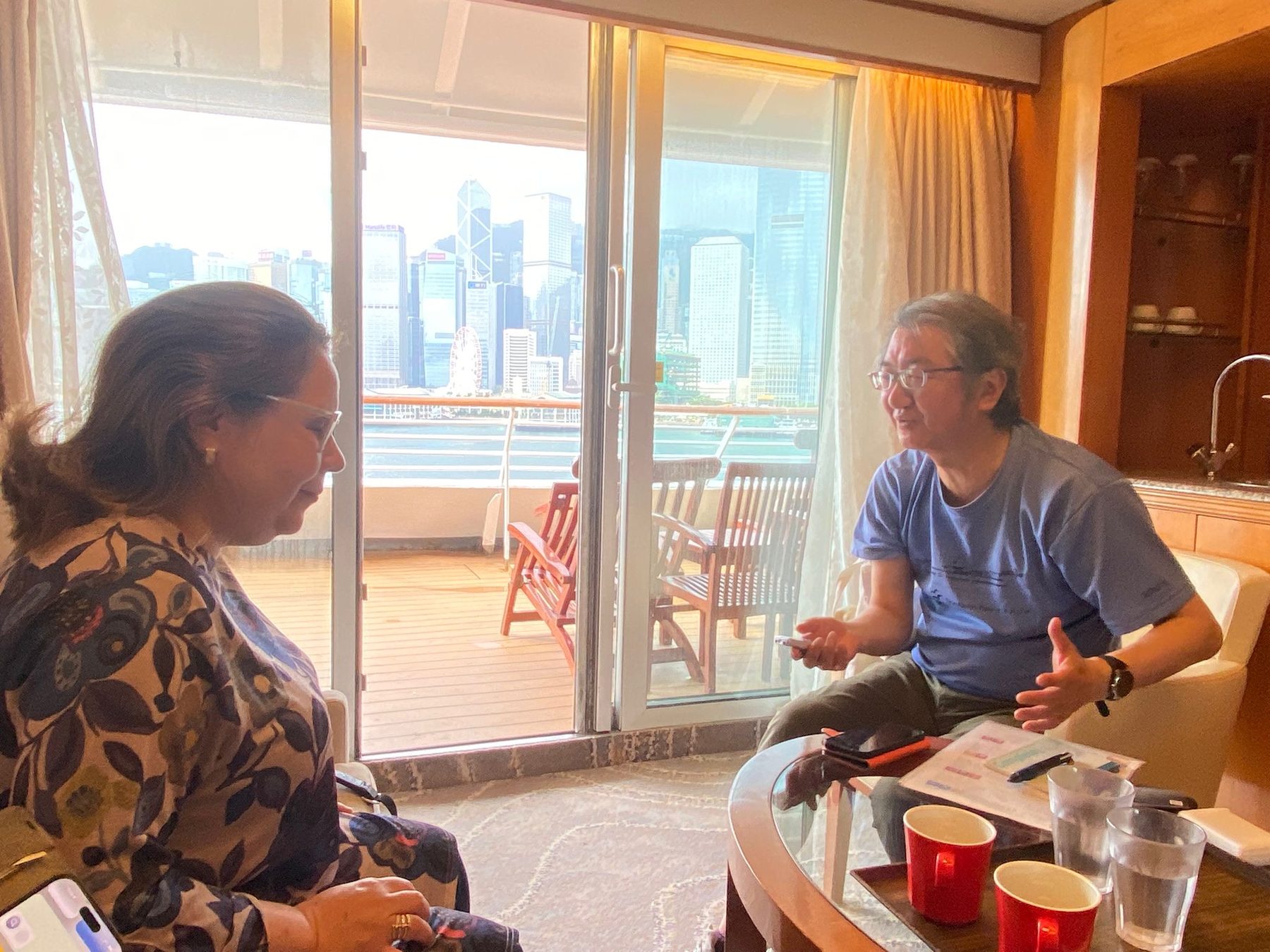 Patricia Vlieg in conversation with Kanamaru Tomoyoshi — Hong Kong skyline