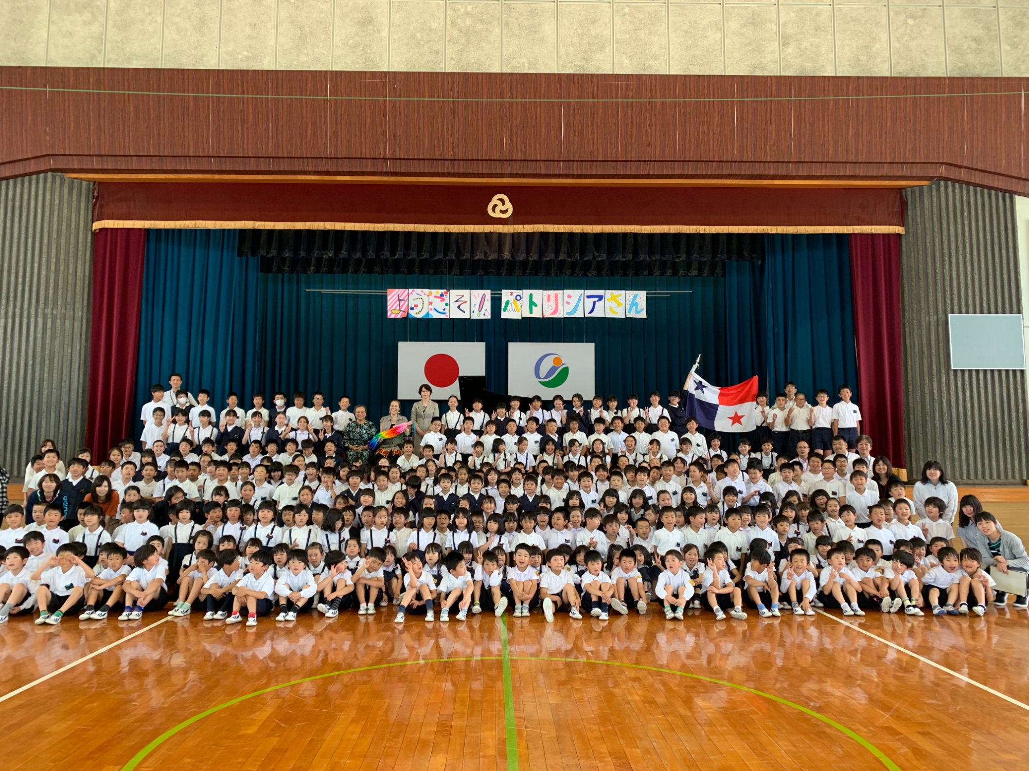 All-school assembly Imabari with welcome banner